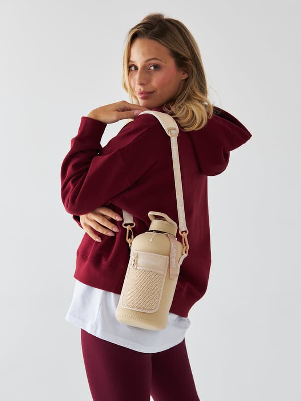 Beige vandflaske med lomme 2,2 l