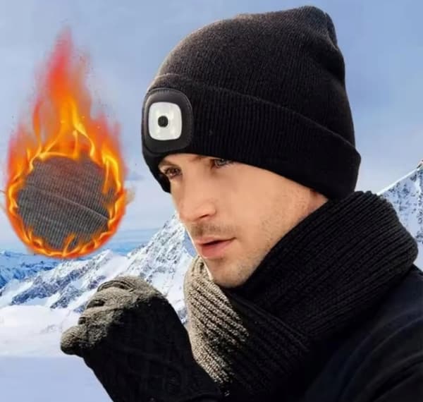 Lämmin talvipipo taskulampulla, LED-otsalampulla ja USB-latauksella.