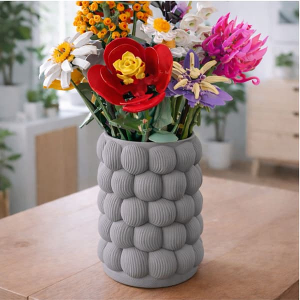 Dekorativ grå vas, strukturell, modern designskulptur