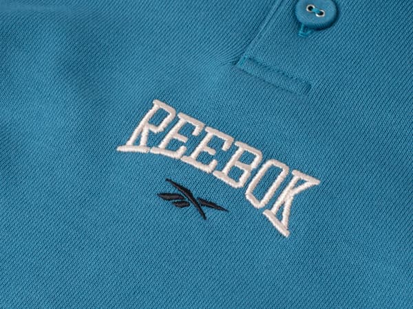 REEBOK - DAM VARSITY COVERUP SWEATSHIRT HS0369 M