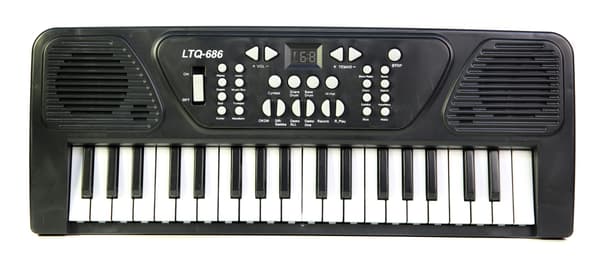 Stor orgel, piano, keyboard med mikrofon