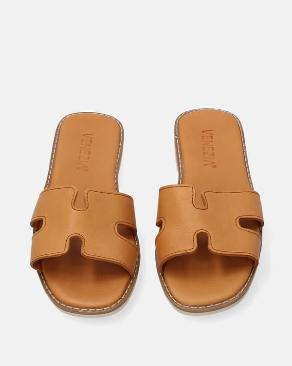 Bruna läderflip-flops med utskärningar för dam Bruna läderflip-flops med utskärningar för dam 37