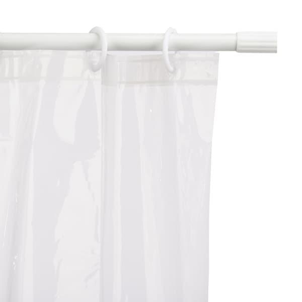 Badrumsset med duschdraperi och transparent matta