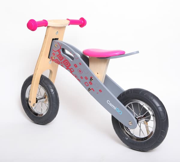 lyserød løbecykel