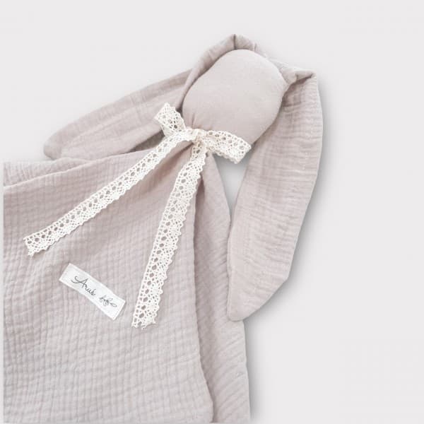 Pupun musliinipehmolelu (Pastelli beige)