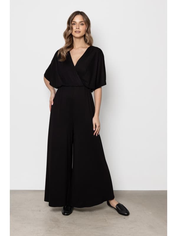Sort elegant jumpsuit med omlægningsstrop og brede ben str. M
