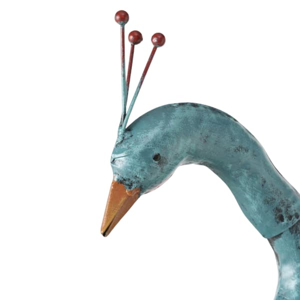 Blå påfuglehaveskulptur