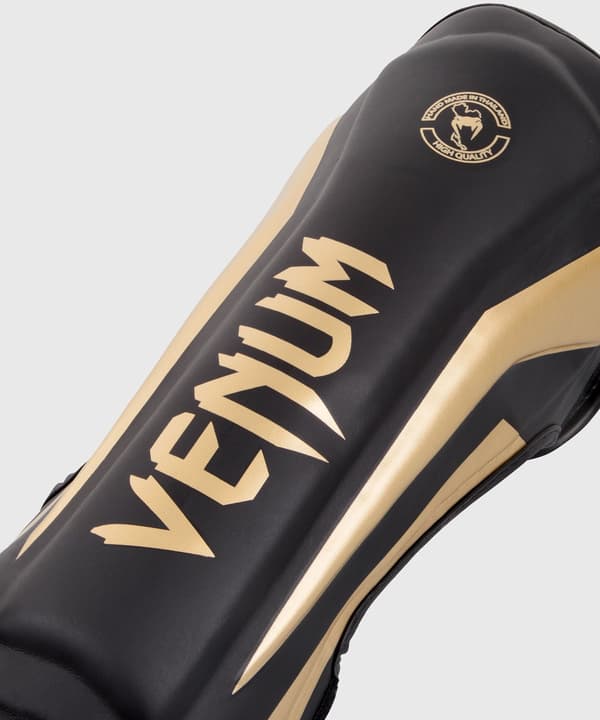 Venum Elite Säärisuojat Musta/Kulta M