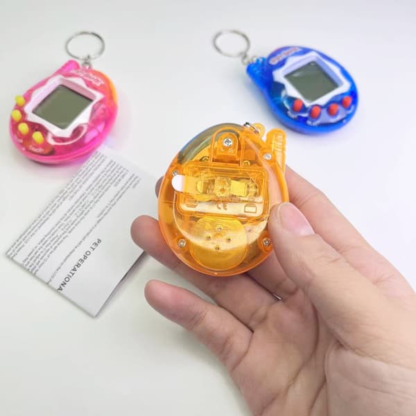 Mini Handheld Virtual Rabbit Pet Keychain Toy - Perfekt för Halloween-, jul- och påskpresenter