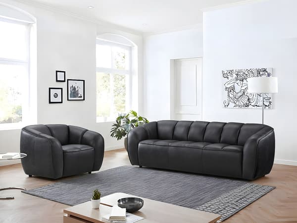 Vente-unique - 3-sitsig soffa och en fåtölj i svart läder PRADONI