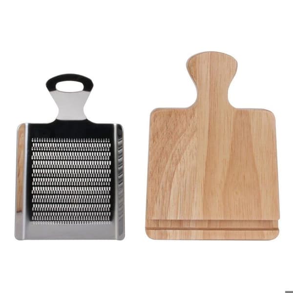 Parmesan rivjärn med dess universalbräda