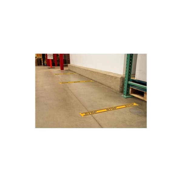 Klistret skylt - STOP - 1m längd - Gul/Svart - PVC - Skyltning