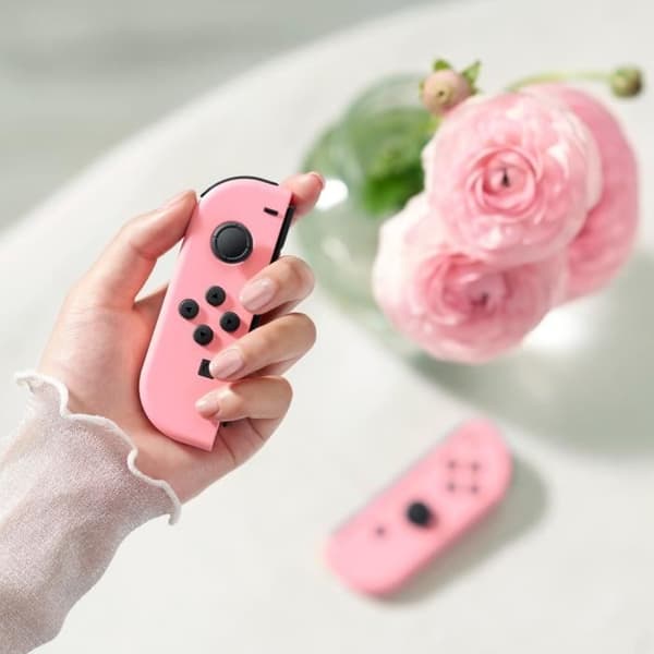 Ett par Pastell Pink Joy-Con-kontroller för Nintendo Switch