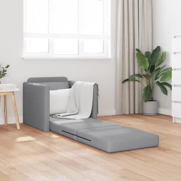 Ljusgrå 2-i-1 sängsoffa på golvet 74x77x81 cm