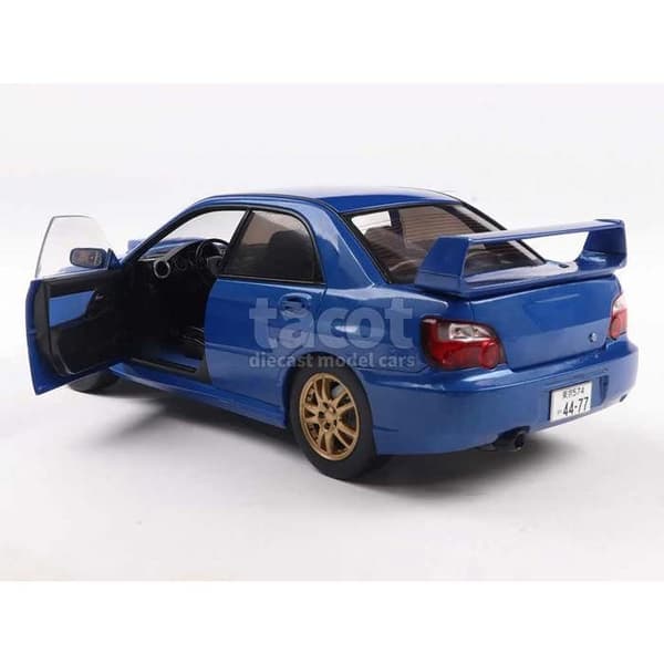 Solid Subaru Impreza WRX STI 2003 Sonic Blue - Miniatyr 1/18
