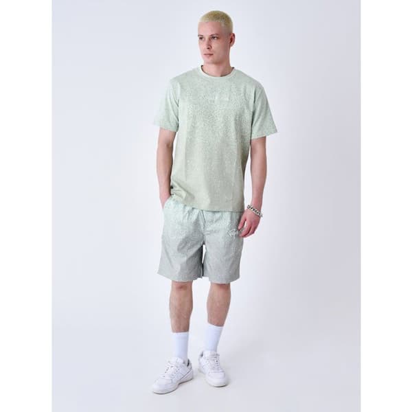 Spray-mönstrad badshorts