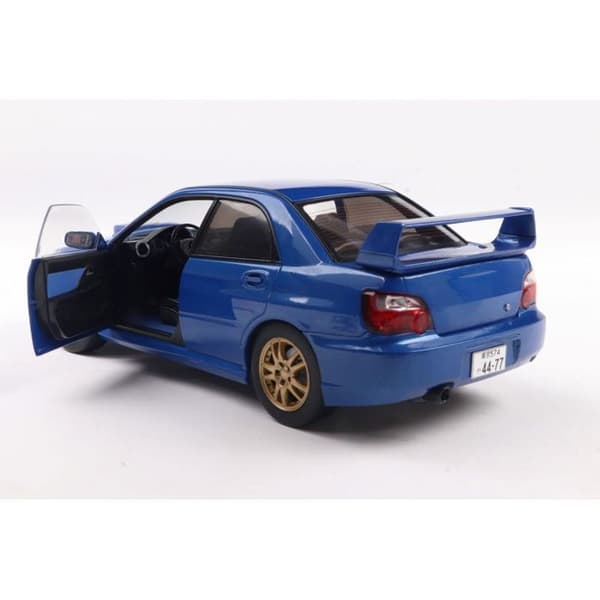 Solid Subaru Impreza WRX STI 2003 Sonic Blue - Miniatyr 1/18