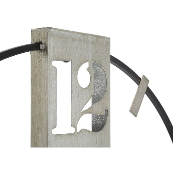Väggklocka i silverfärgad metall cm 61x4,5x63