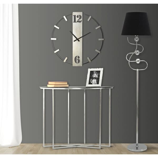 Väggklocka i silverfärgad metall cm 61x4,5x63