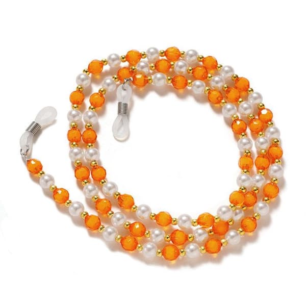 Hängeögonbryn med orange pärlor