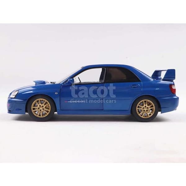 Solid Subaru Impreza WRX STI 2003 Sonic Blue - Miniatyr 1/18