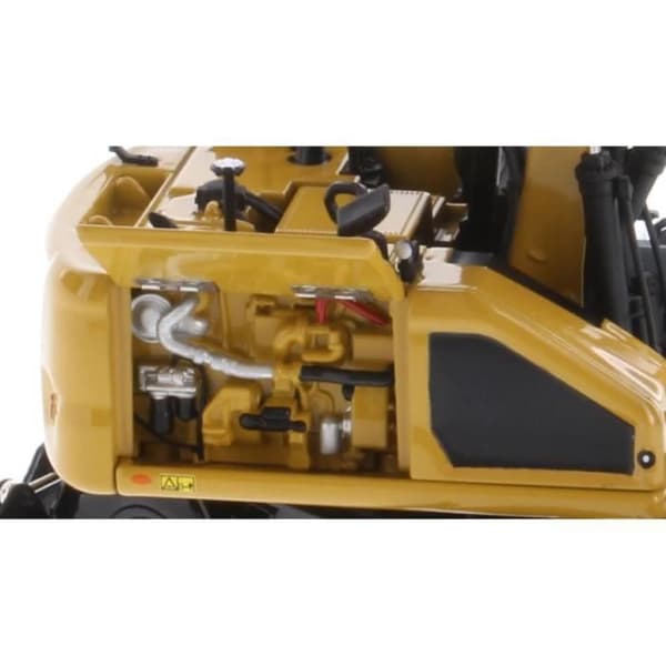 Pelle CATERPILLAR M318 - Gul
