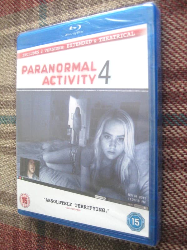 PARANORMAL ACTIVITY 4 BLU RAY AND Brand New