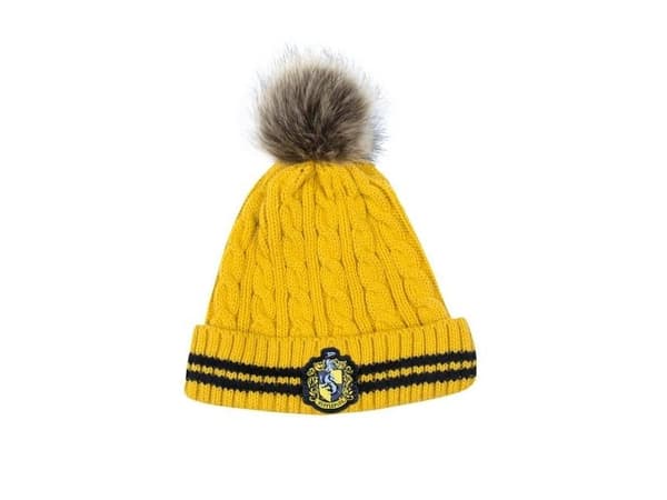 Hufflepuff-hattu tupsulla