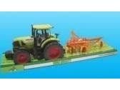 Traktor med lantbruksutrustning