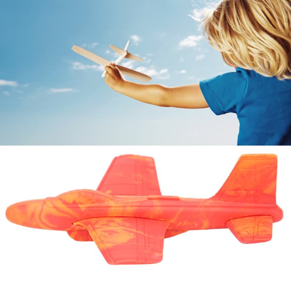 Barnens röda skumglidflygplan utomhus kastleksak