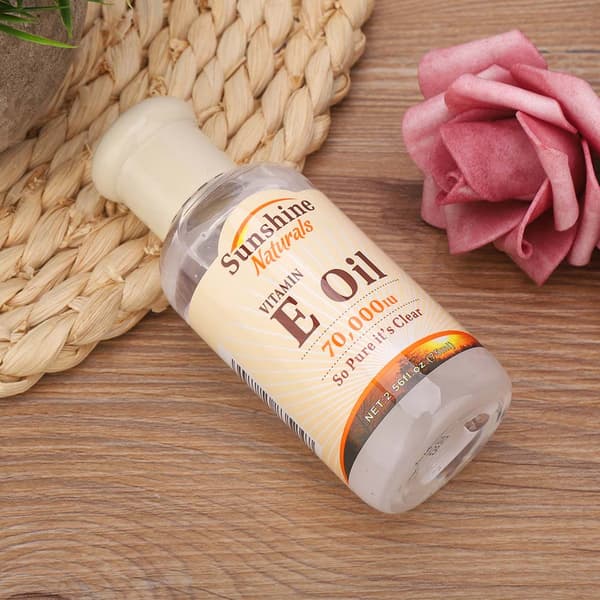 E-vitamiini-esanssiöljy valkaiseva kosteuttava ihonhoito ravitseva (75 ml musta pullo yöksi)