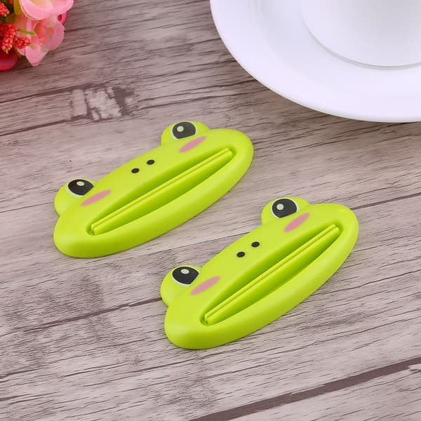 2-pack tandkrämstubpressare, enkel pressdispenser, rullhållare, tecknad groda