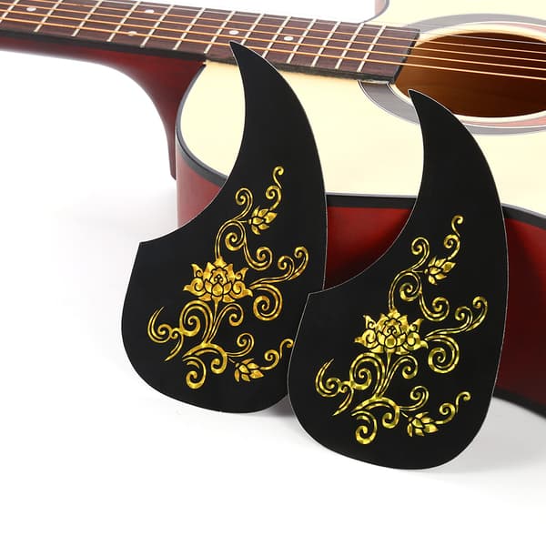 2 st kommaformade plektrumskydd för akustisk gitarr (guldranka)