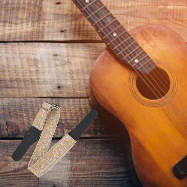 Retro broderad bred gitarrrem, justerbar längd för akustiska, elektriska och basgitarrer, guldkant