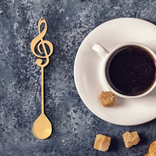 Dessertskefuld i rustfrit stål med musiknote til kaffe og omrøring (guld)