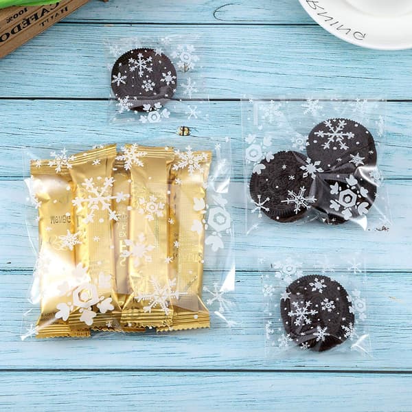 100 st julklappsförpackningspåse Plastförpackningspåse Snöflinga Tryckt Godisförpackningspåse