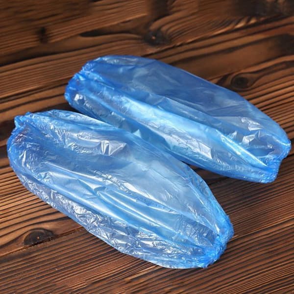 100 st/förpackning Plastärmar Engångsärmskydd Blå
