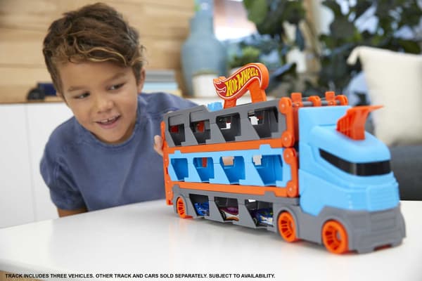 HW CITY RACING TRANSPORTER 2IN1 HGH33 WB1