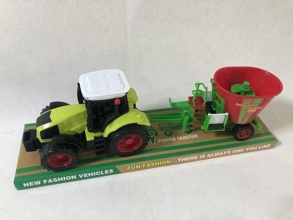Traktor med jordbruksmaskin