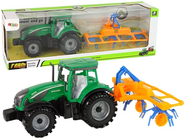 Traktor med kratta och friktionsdrift
