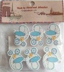 Dekorativa babyspännen
