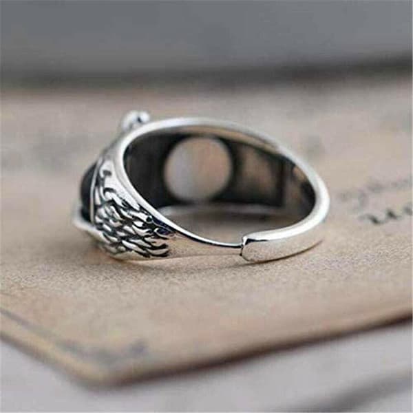 Ring i zinklegering, ugle