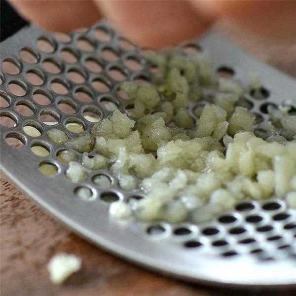 Vitlökspress med handtag