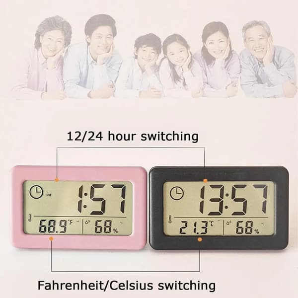 Digitalt vækkeur med termometer og hygrometer, LED-display, der viser indendørs luftfugtighed, grøn
