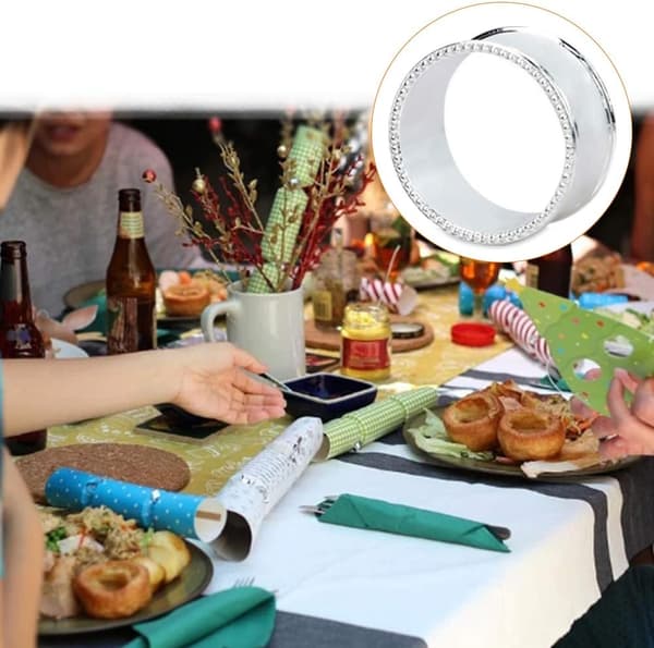 12 servietringe, perlebesatte sider, rustfrit stål og elegant sølv servietklemme.