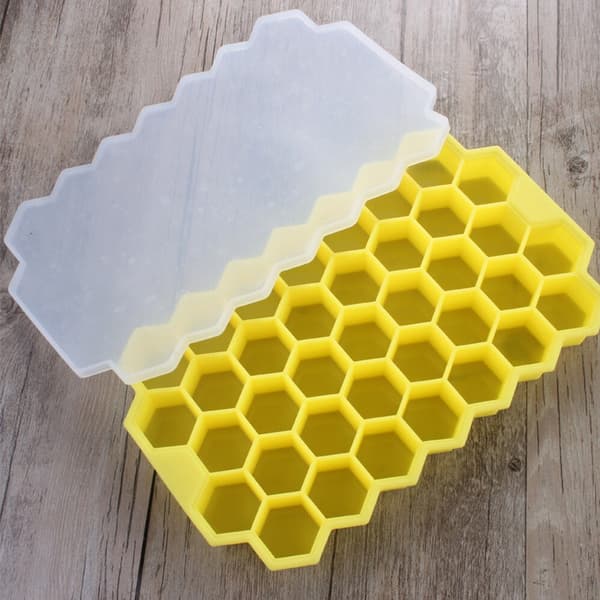 37-facks isbitsform i silikonplastbehållare med bikakeformat lock, vit