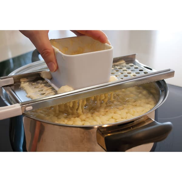Nudel- och dumplingmaskin med säkerhetsbehållare