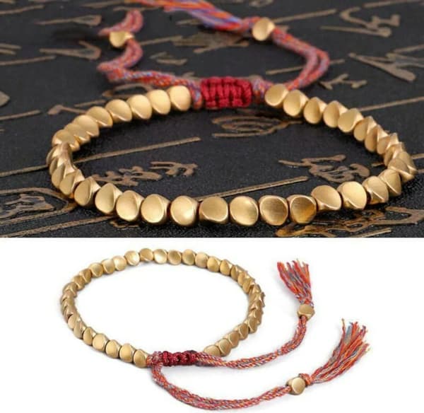 Tibetanskt buddhistiskt flätat koppararmband