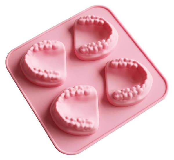 Tandformad isform, isform i silikon, kan göra tandprotesformade isbitar