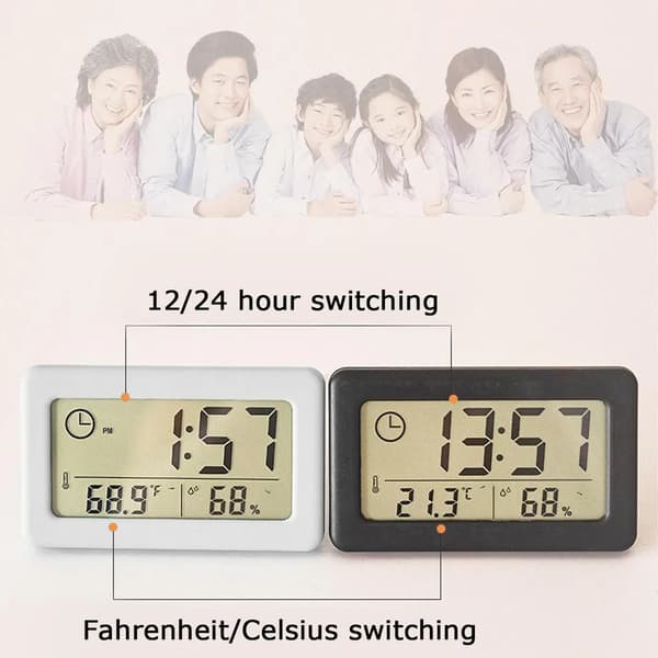 Digitalt vækkeur med termometer og hygrometer, LED-display, der viser indendørs luftfugtighed, sort.